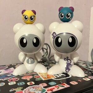 Funko White and Gray Figures with Yellow and Blue Companions